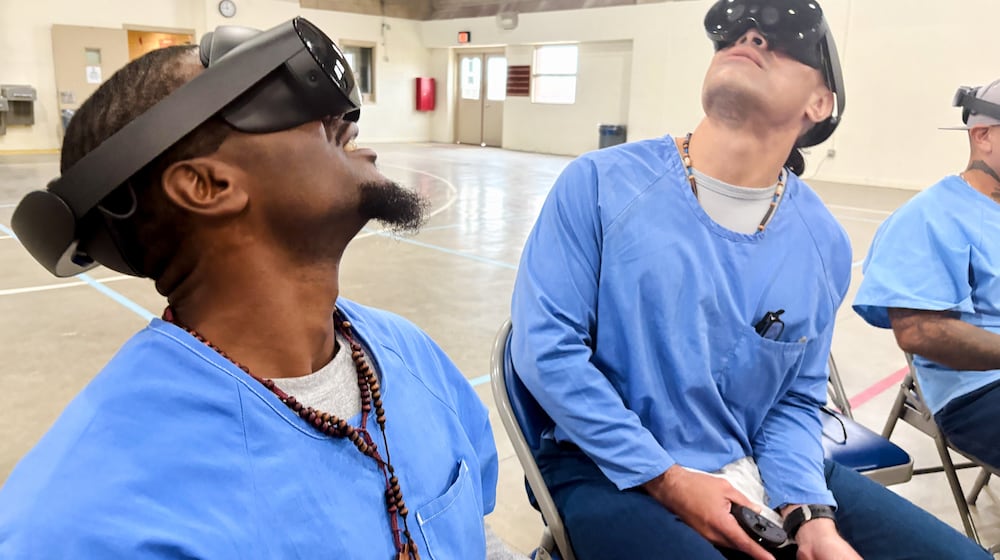 Incarcerated men use virtual reality headsets inside Valley State Prison in Chowchilla, Calif., Dec. 11, 2025. (AP Photo/Haven Daley)