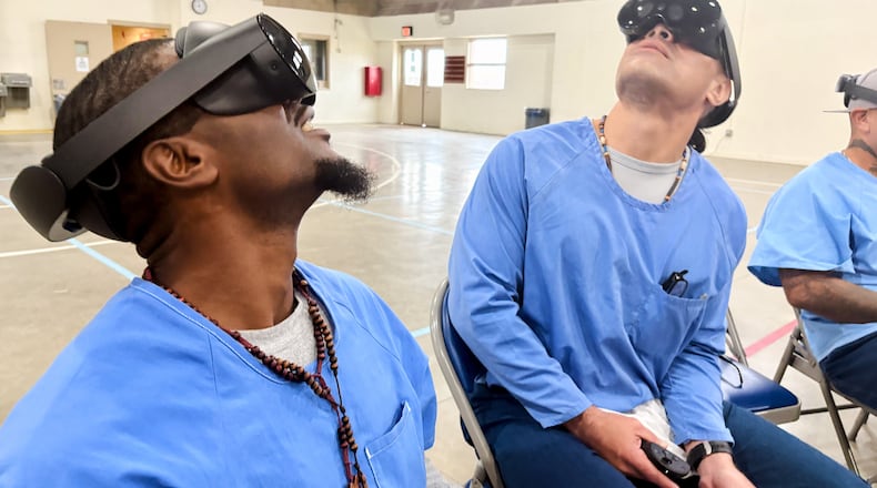 Incarcerated men use virtual reality headsets inside Valley State Prison in Chowchilla, Calif., Dec. 11, 2025. (AP Photo/Haven Daley)