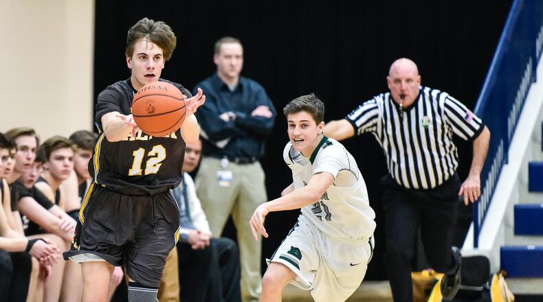 Archbishop Alter’s Jack Smith makes a pass. NICK GRAHAM/STAFF
