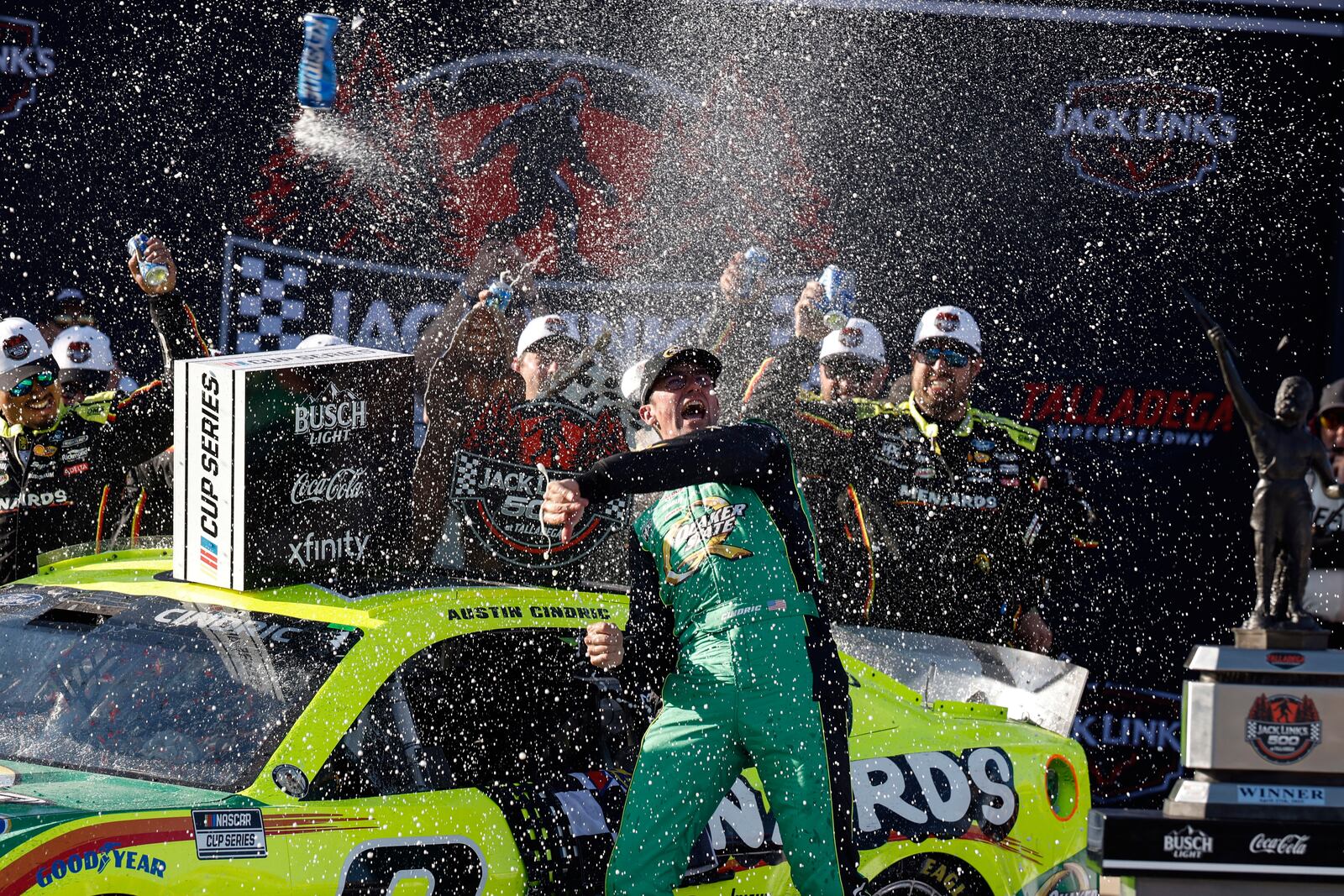 NASCAR Cup Series driver Austin Cindric celebrates after winning a NASCAR Cup Series auto race at Talladega Superspeedway, Sunday, April 27, 2025, in Talladega, Ala. (AP Photo/Butch Dill)