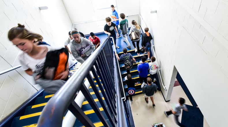 Students change classes in the junior high section of Monroe Junior/Senior High School.