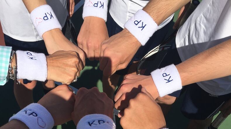 Members of the Oakwood High varsity boys tennis team honored Kyle Plush, the Cincinnati teen who died this month when he suffocated after being pinned by a seat in his minivan. The team wore wristbands that had Plush’s initials and a heart on them in a match Monday evening against Seven Hills the team for which Plush played. SUBMITTED