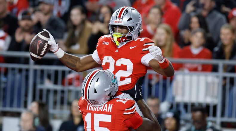 Ohio State running back Isaiah West celebrates after his touchdown against UCLA during the second half of an NCAA college football game, Saturday, Nov. 15, 2025, in Columbus, Ohio. (AP Photo/Jay LaPrete)