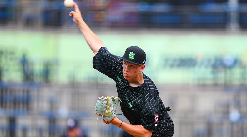 Badin pitcher Caleb Driessen sends a pitch to the plate against Licking Valley in a Division III state semifinal game on Friday at Canal Park in Akron. KYLE HENDRIX / CONTRIBUTED
