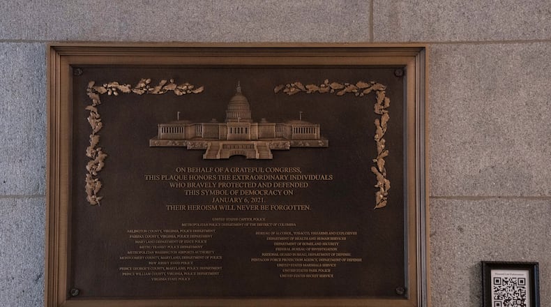A plaque honoring police service on Jan. 6, 2021 at the Capitol, Saturday, March 7, 2026, in Washington. (AP Photo/Allison Robbert)