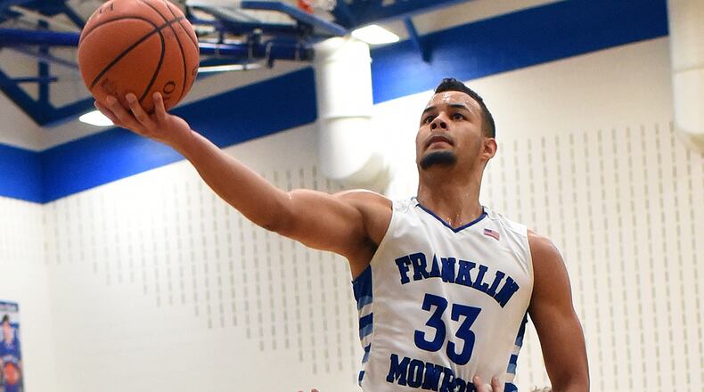 Franklin Monroe senior Ethan Conley scored a Jets’ record 54 points in a 92-80 defeat of visiting Houston on Dec. 8 and is the Southwest District D-IV player of the year. DALE BARGER / CONTRIBUTED