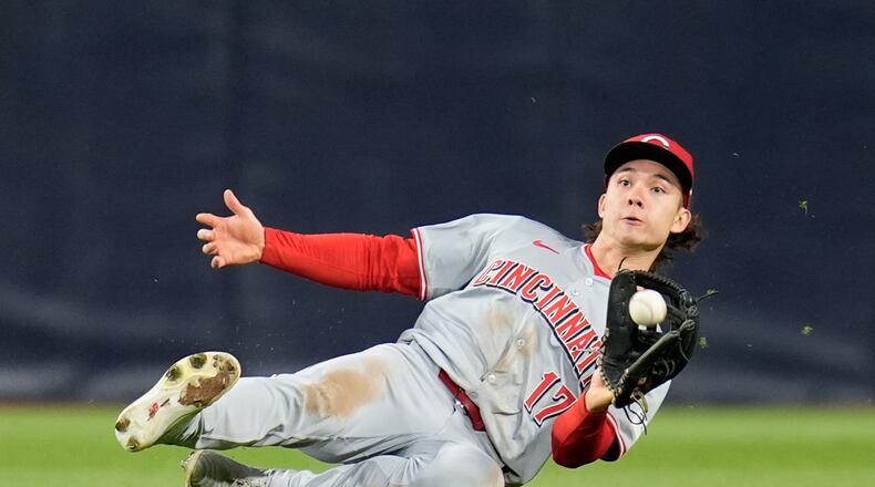 Cincinnati Reds center fielder Stuart Fairchild makes a sliding catch for the out on San Diego Padres' Luis Campusano during the fourth inning of a baseball game, Tuesday, April 30, 2024, in San Diego. (AP Photo/Gregory Bull)