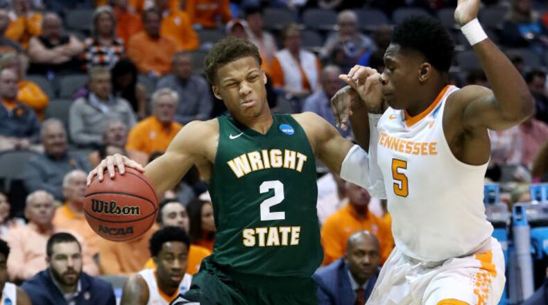 DALLAS, TX - MARCH 15: Everett Winchester #2 of the Wright State Raiders drives on Admiral Schofield #5 of the Tennessee Volunteers in the first half in the first round of the 2018 NCAA Men’s Basketball Tournament at American Airlines Center on March 15, 2018 in Dallas, Texas. (Photo by Ronald Martinez/Getty Images)