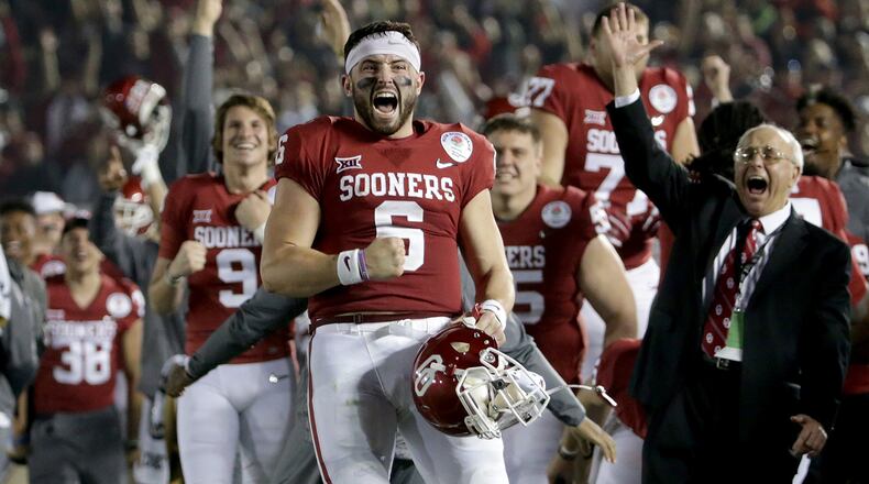 PASADENA, CA - JANUARY 01: Baker Mayfield #6 of the Oklahoma Sooners celebrates after Steven Parker #10 of the Oklahoma Sooners scores a 46 yard touchdown because of a fumble by Sony Michel #1 of the Georgia Bulldogs in the 2018 College Football Playoff Semifinal at the Rose Bowl Game presented by Northwestern Mutual at the Rose Bowl on January 1, 2018 in Pasadena, California. (Photo by Jeff Gross/Getty Images)