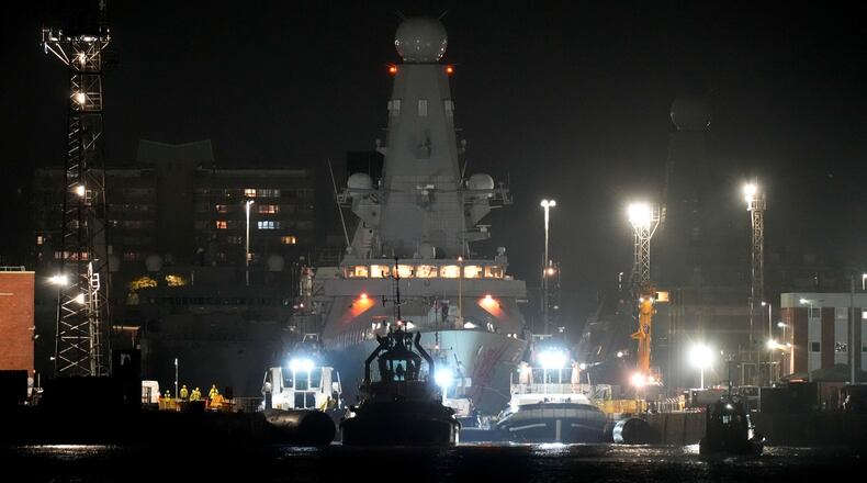 Royal Navy Type 45 destroyer HMS Dragon at the HM Naval Base, in Portsmouth Harbour, in Hampshire, England, Tuesday March 3, 2026, ahead of being deployed to protect British military personnel in Cyprus. (Andrew Matthews/PA via AP)