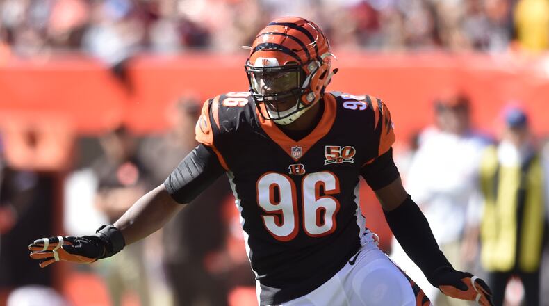 Cincinnati Bengals defensive end Carlos Dunlap (96) blocks against the Cleveland Browns during an NFL football game, Sunday, Oct. 1, 2017, in Cleveland. Cincinnati won 31-7. (AP Photo/David Richard)