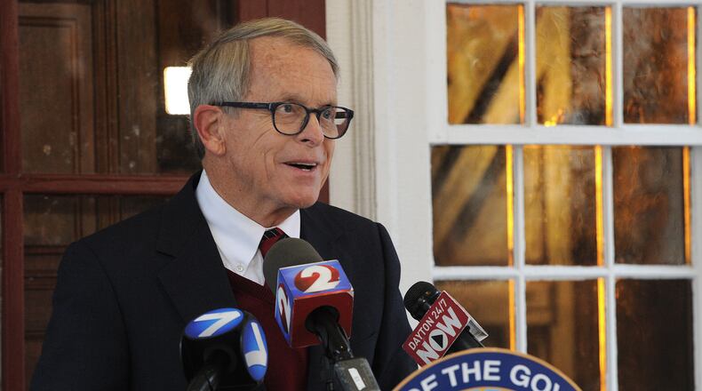 Ohio Governor Mike DeWine gives a press conference from his home early Wednesday morning, Nov 18,. MARSHALL GORBY\STAFF
