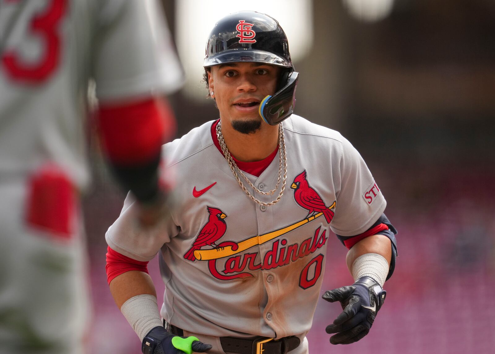 St. Louis Cardinals' Masyn Winn jogs to the dugout after hitting a solo home run during the ninth inning of the first baseball game of a doubleheader against the Cincinnati Reds, Wednesday, April 30, 2025, in Cincinnati. (AP Photo/Jeff Dean)