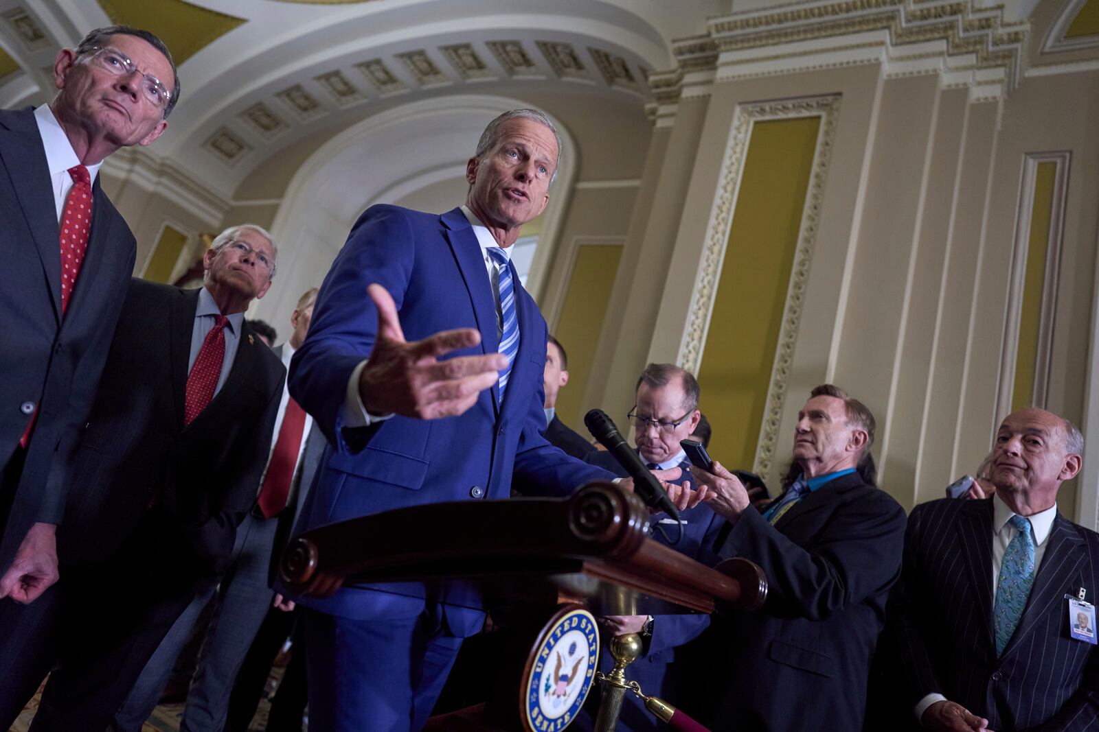 From left, Sen. John Barrasso, R-Wyo., the GOP whip, and Sen. Roger Wicker, R-Miss., chairman of the Senate Armed Services Committee, join Senate Majority Leader John Thune, R-S.D., to speaks with reporters at the Capitol in Washington, Tuesday, June 10, 2025. (AP Photo/J. Scott Applewhite)