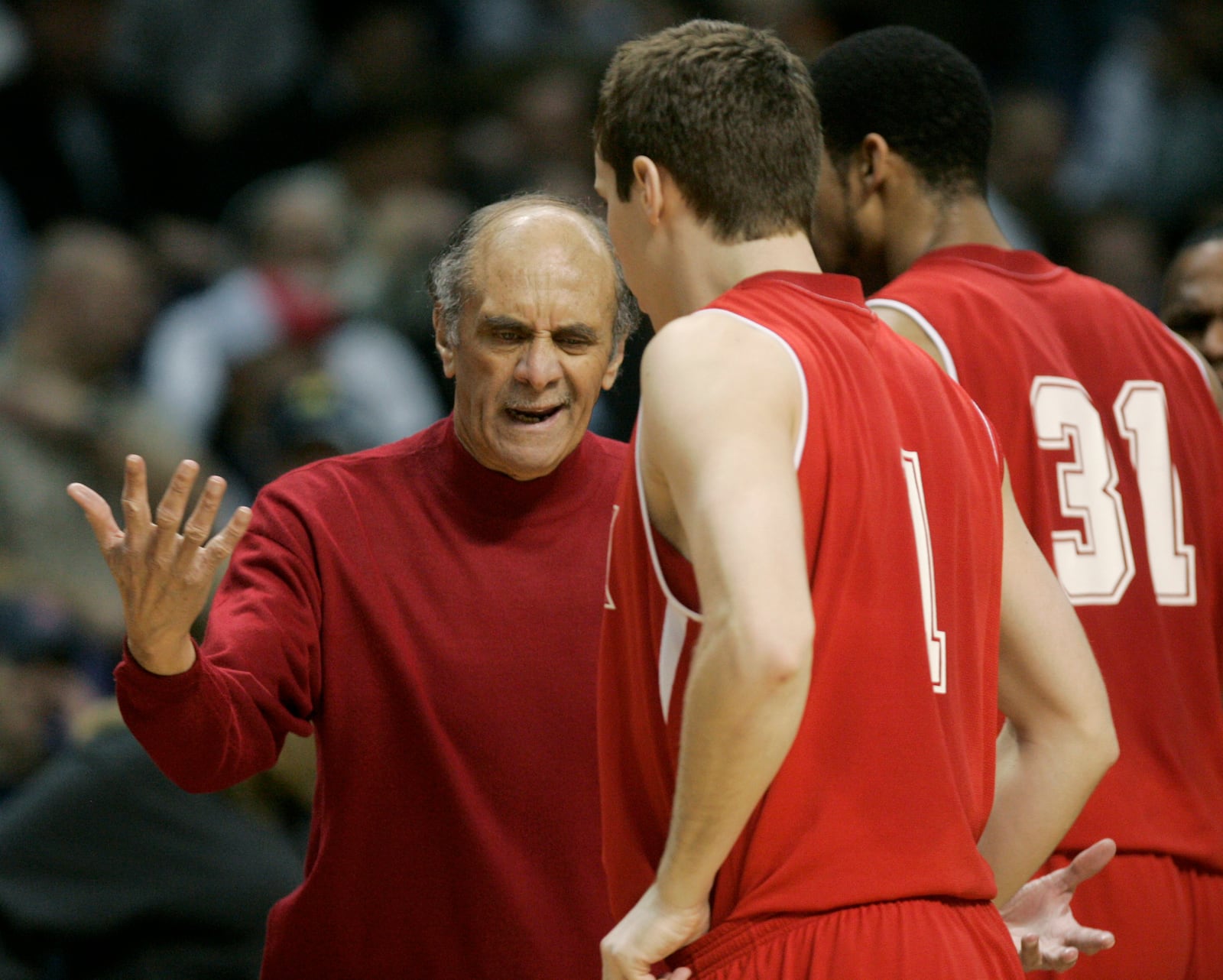 Miami of Ohio coach Charlie Coles expresses frustration to Doug Penno, center, and Nathan Peavy, right, in the first half against Oregon on Friday, March 16, 2007, at Spokane Arena in Spokane, Wash., in an NCAA Midwest Regional first-round basketball game. (AP Photo/Elaine Thompson)