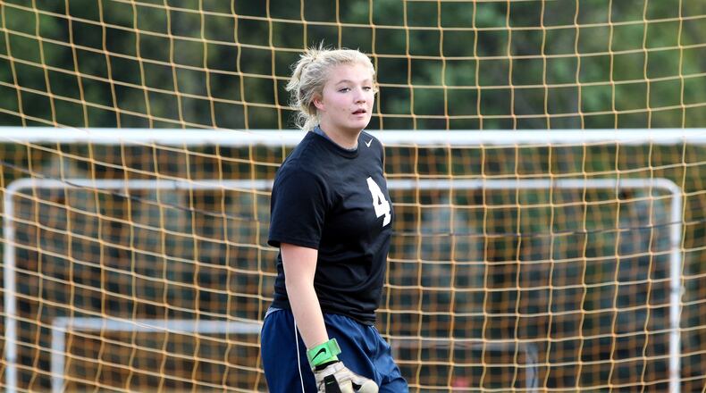 Ross goalkeeper Anna Hall works out during a Sept. 16, 2013, practice session at the school. COX MEDIA FILE PHOTO