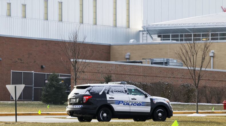 Fairfield Police presence was increased this morning at all Fairfield Schools in the wake of a threat of violence announced by school officials. Police cruisers were stationed at the 10,000-student districts schools as part of law enforcement's response. Classes are being conducted as normal while police in Fairfield and Fairfield Twp. are investigating. (Photo By Nick Graham\Journal-News)