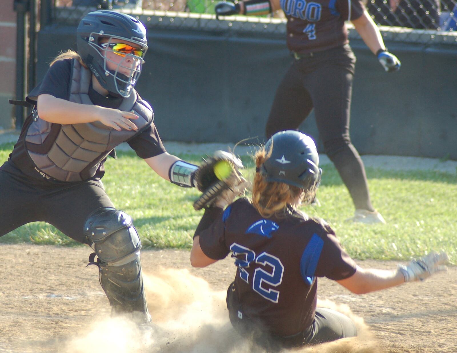 Lakota East catcher Sydney Walsh puts the tag on Springboro’s Sophie Weber in the seventh inning of a Division I sectional final at West Carrollton. Weber was called safe on the play. CONTRIBUTED PHOTO BY JOHN CUMMINGS