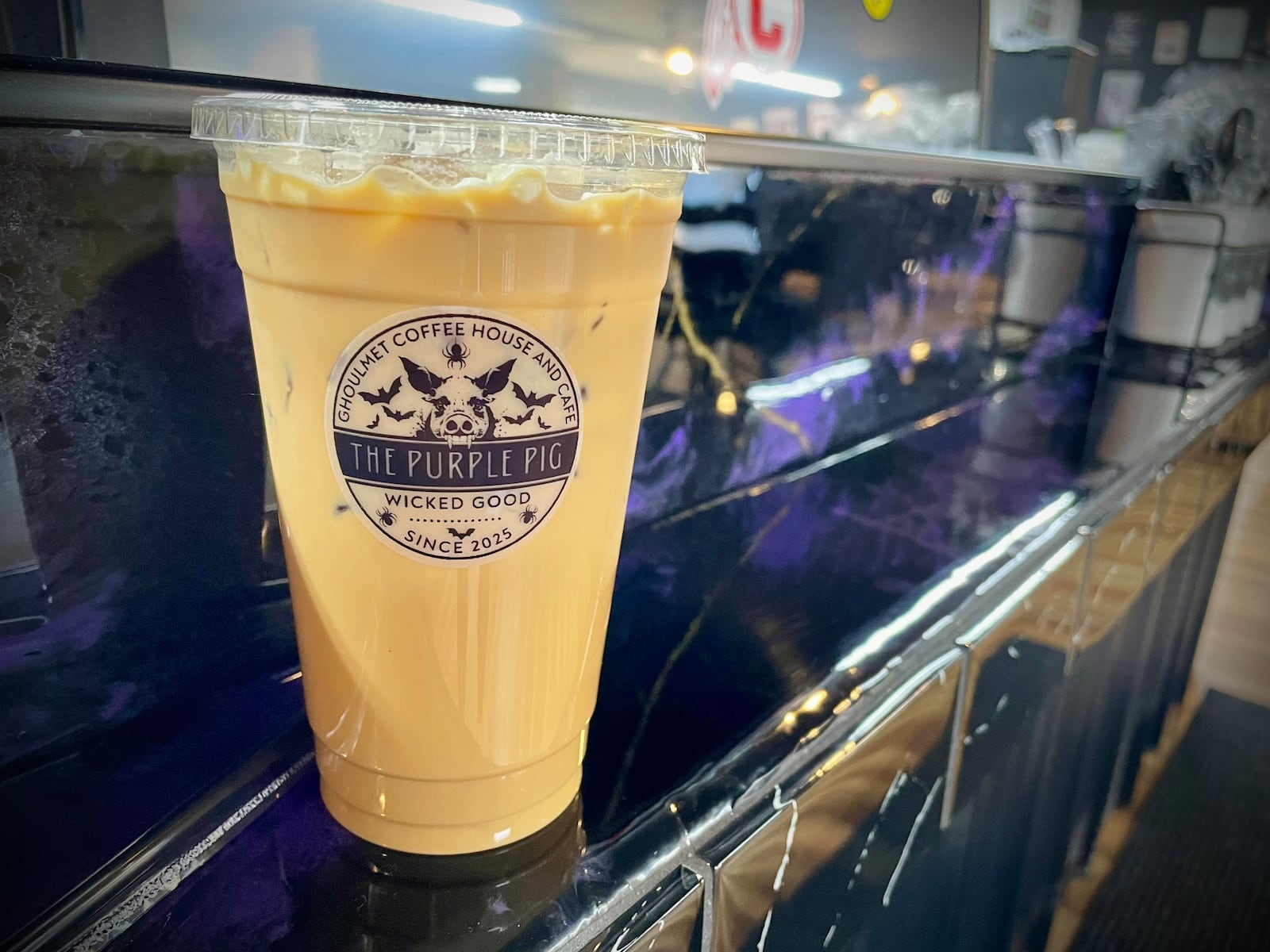 The Purple Pig Cafe is a coffee shop located at 751 Dayton Oxford Road in Carlisle. Pictured is the Bonfire Latte. NATALIE JONES/STAFF