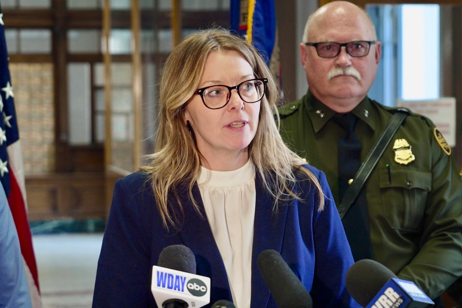 Acting U.S. Attorney Lisa D. Kirkpatrick spoke to reporters following the sentencing of Harshkumar Ramanlal Patel and Steve Anthony Shand, who were convicted on human smuggling charge related to the 2022 deaths of an Indian family who froze while crossing into the U.S. from Canada, on Wednesday, May 28, 2025, in Fergus Falls, Minn. (AP Photo/Mark Vancleave)