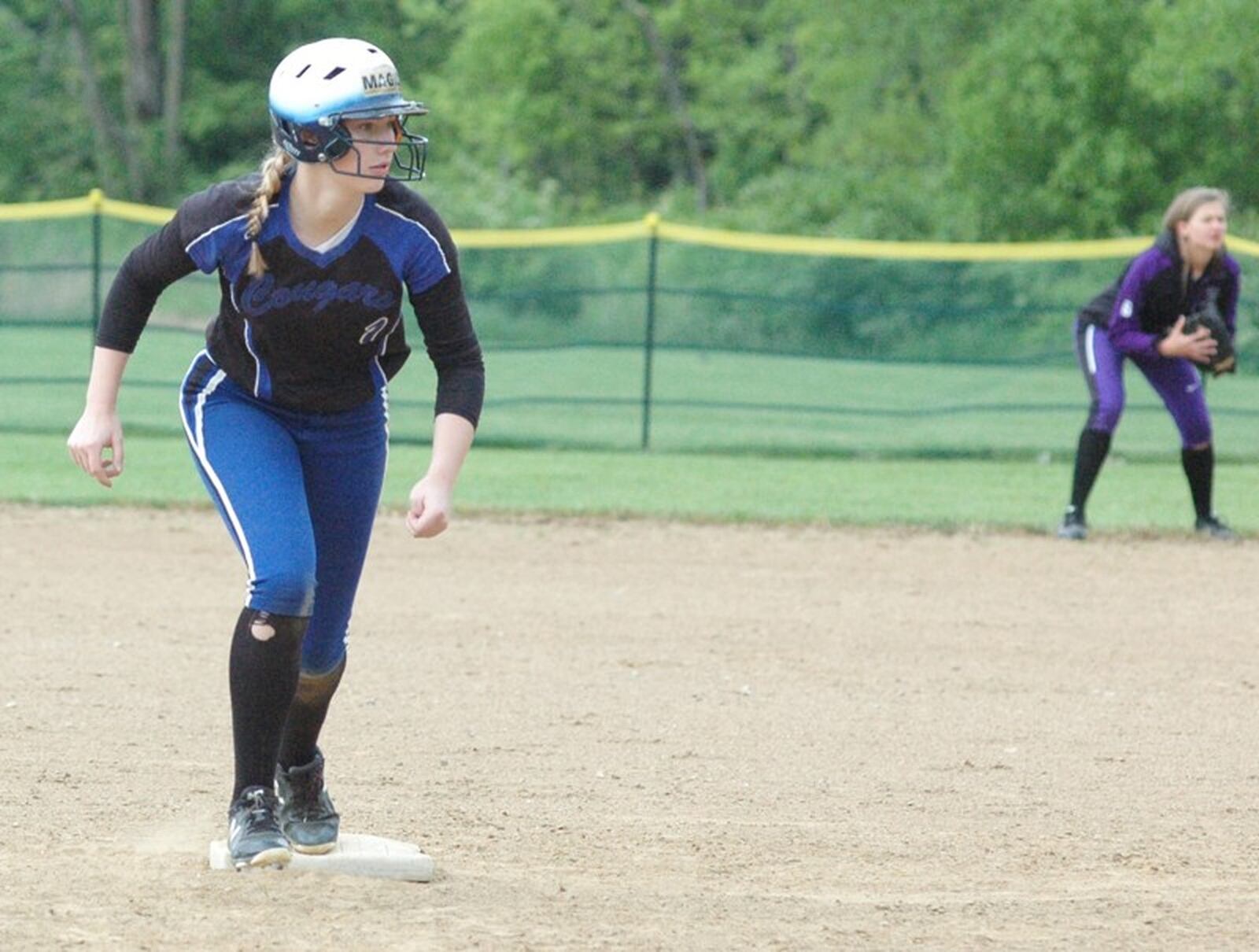 Cincinnati Christian’s Jenna Monk prepares to take off from second base May 10 during a Miami Valley Conference Scarlet Division softball game against visiting Cincinnati Hills Christian Academy. CCS won 5-4. RICK CASSANO/STAFF