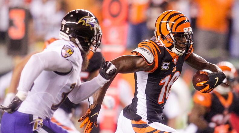 Cincinnati Bengals wide receiver A.J. Green carries the ball in for a touchdown during their game against the Baltimore Ravens Thursday, Sept. 13 at Paul Brown Stadium in Cincinnati. The Cincinnati Bengals defeated the Baltimore Ravens 34-23. NICK GRAHAM/STAFF