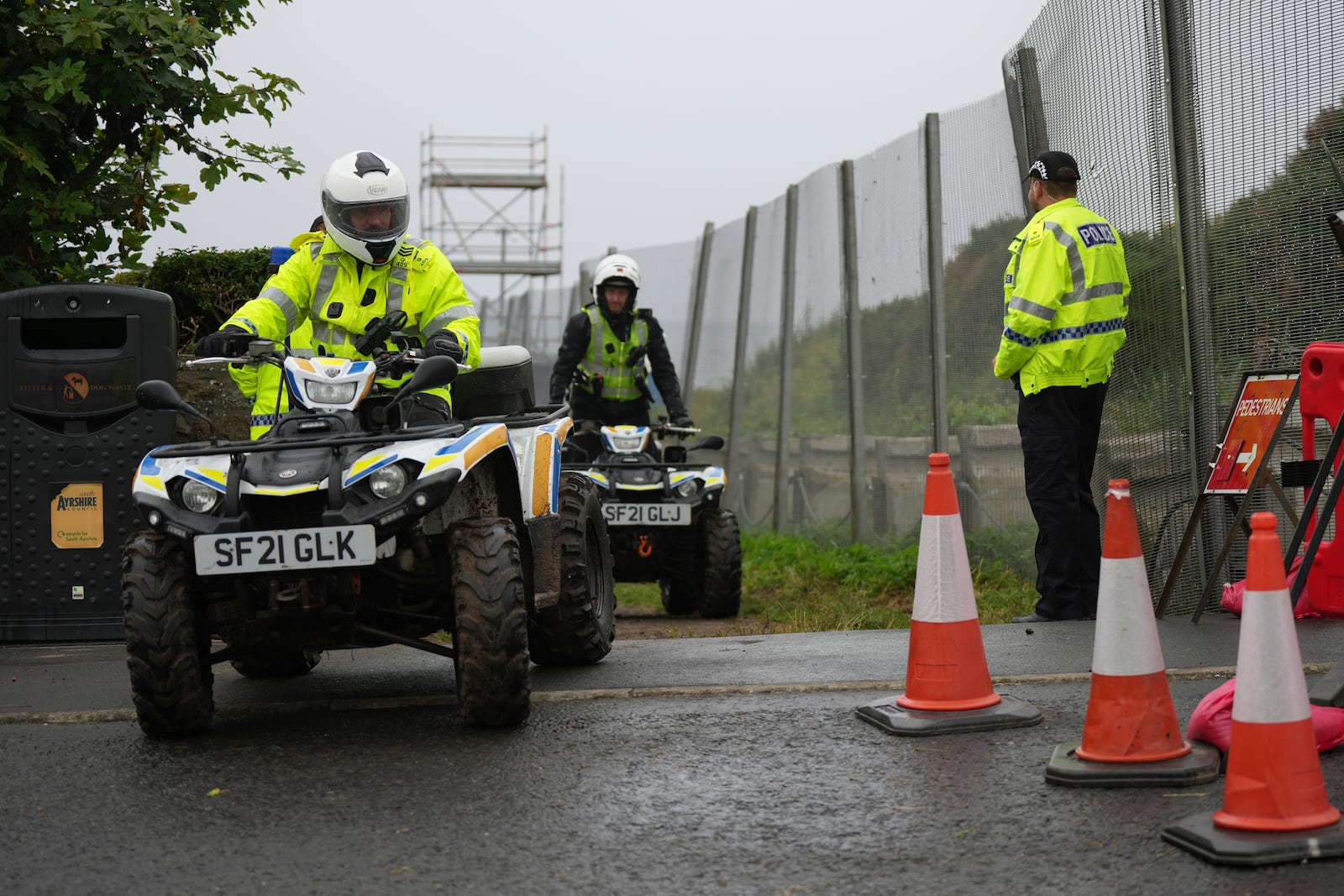 Police on buggies guard the Trump Turnberry golf course in Turnberry, Scotland, Friday, July 25, 2025, ahead of President Trump's visit Scotland. (AP Photo/Alastair Grant)