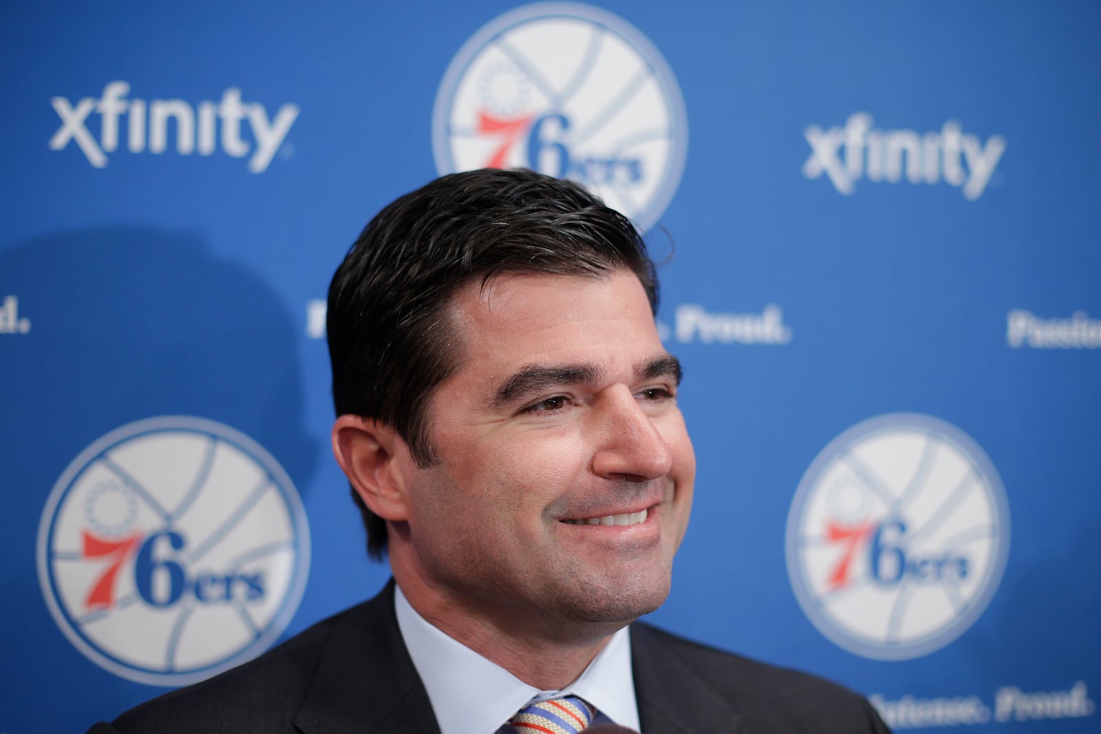 FILE - Philadelphia 76ers chief executive officer Scott O'Neil speaks to reporters at the team's NBA basketball training facility, July 8, 2013, in Philadelphia. (AP Photo/Matt Rourke, File)