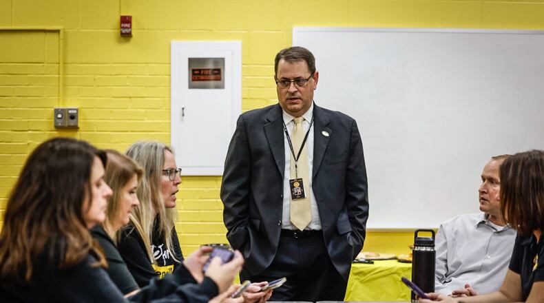 Centerville schools Superintendent Jon Wesney talks to district administrators during a Nov. 7, 2023 election watch party. In the Dayton area, Centerville City Schools had the second-highest number of students living in the district and attending private schools on vouchers this past school year, according to the Ohio Department of Education and Workforce data. Jim Noelker/Staff