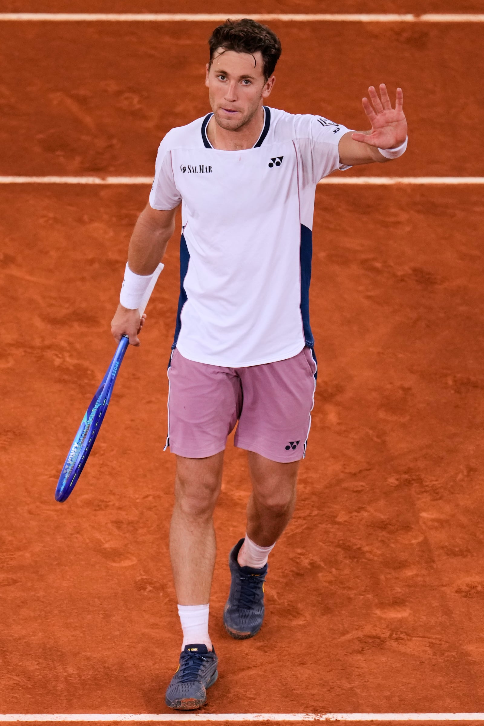 Casper Ruud of Norway celebrates after winning against Francisco Cerundolo from Argentina during men's semifinal at the Madrid Open tennis tournament in Madrid, Spain, Friday, May 2, 2025. (AP Photo/Manu Fernandez)