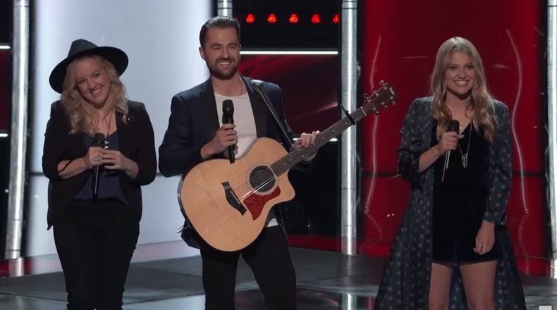 Wyoming, Ohio natives Megan, 31, Ryan, 25, and Katey, 28, make up the sibling trio The Bundys that were selected to be on The Voice on NBC. Pictured is the group during the Feb. 26 airing of the blind auditions of The Voice when they were chosen to be on the show. PHOTO COURTESY OF NBC/THE VOICE
