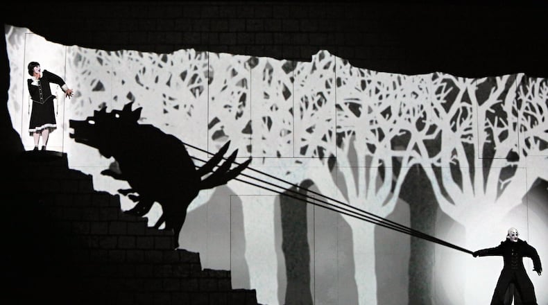 In this re-imagined version of Mozart’s “The Magic Flute,” opening at the Aronoff Center on July 15, a silent movie-style video projection backdrops the performers. CONTRIBUTED