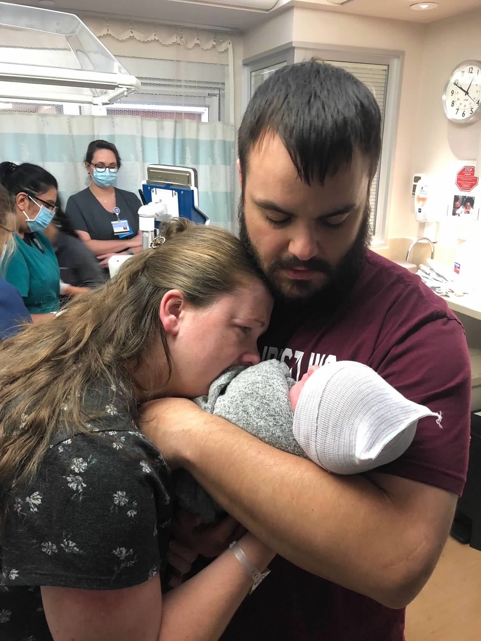 Jeremy and Liz Lovy comfort their son, Logan, after he died Sept. 15, 2021 at Miami Valley Hospital in Dayton. SUBMITTED PHOTO
