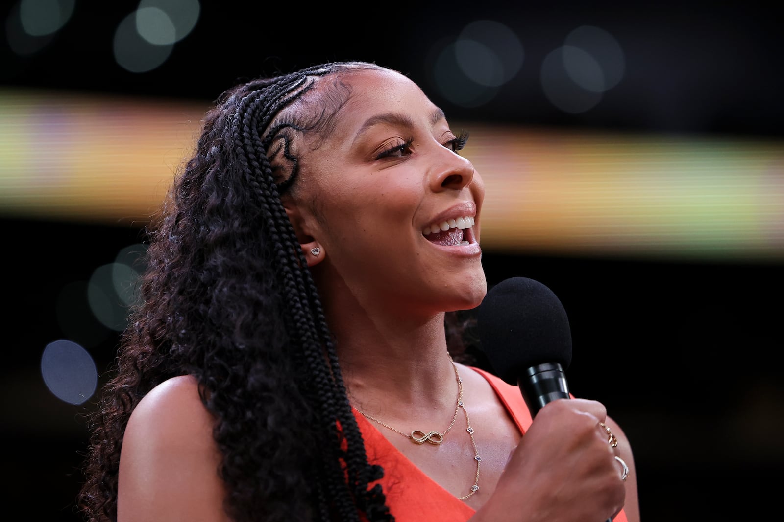 Former Los Angeles Sparks player Candace Parker speaks during her jersey retirement ceremony during a WNBA basketball game between the Sparks and the Chicago Sky, Sunday, June 29, 2025, in Los Angeles. (AP Photo/Jessie Alcheh)