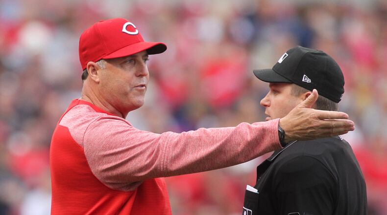 Reds manager Bryan Price argues with home-plate umpire Tim Timmons during a game against Indians on Tuesday, May 23, 2017, at Great American Ball Park in Cincinnati. David Jablonski/Staff