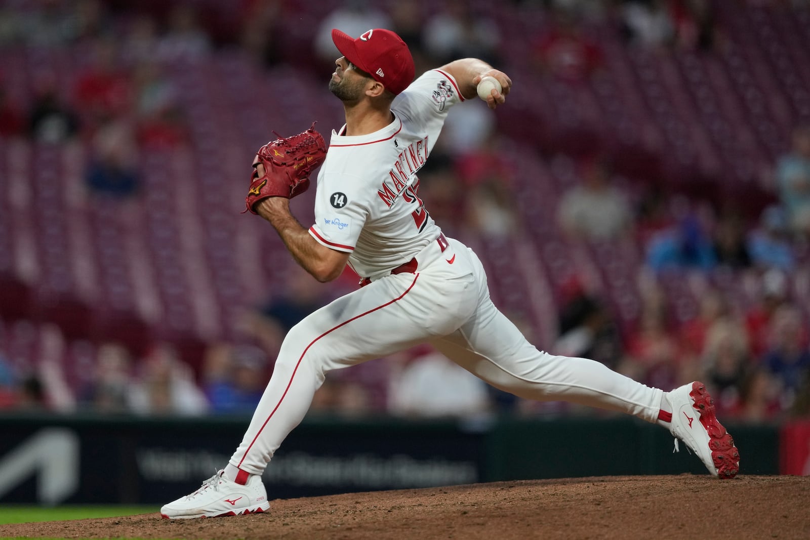 Cincinnati Reds pitcher Nick Martinez throws during the fifth inning of a baseball game against the Toronto Blue Jays Wednesday, Sept. 3, 2025, in Cincinnati. (AP Photo/Carolyn Kaster)