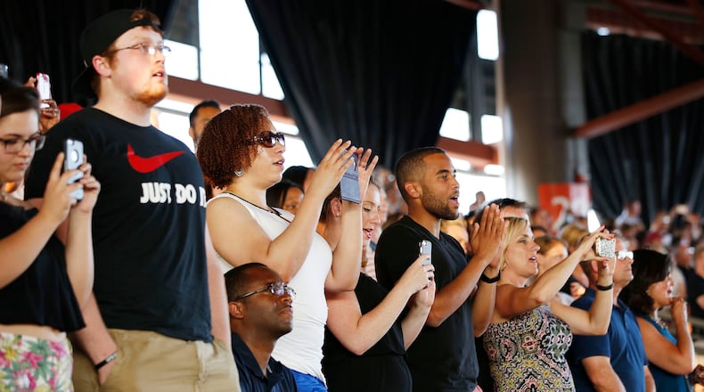 Patrons watch as John Legend performs at the Rose Music Center during a June 2017 concert. TY GREENLEES / STAFF