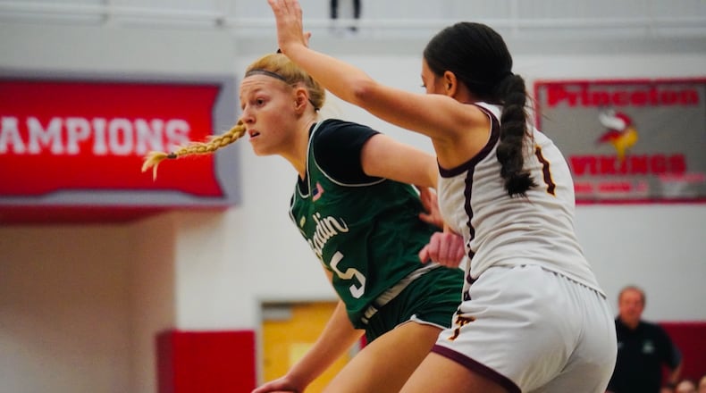 Badin's Addilyn Marshall (5) is guarded by Turpin's Kylie Vortkamp (1) on Thursday night at Princeton. Chris Vogt/CONTRIBUTED