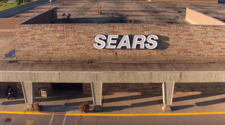 Closures of Sears stores like the one at the Dayton Mall are part of a plan to return to profitability. TY GREENLEES / STAFF