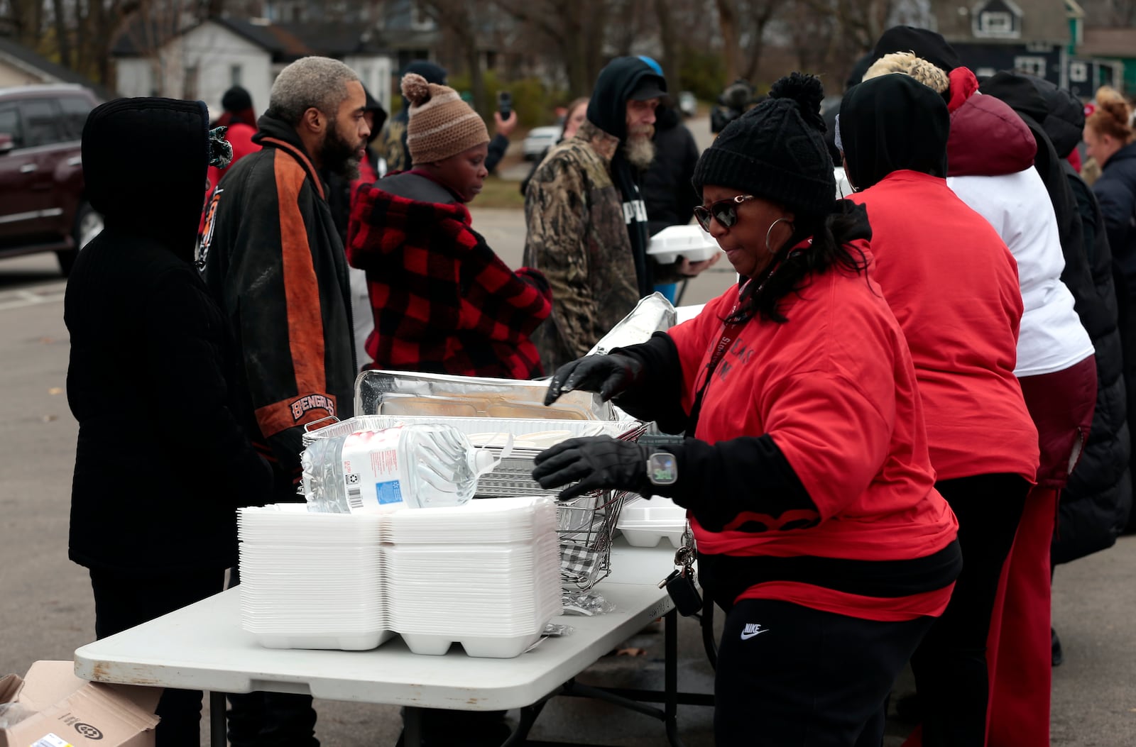 Jamier Brown and members of his family and representation organized a Thanksgiving food giveaway on Wed., Nov. 26, 2025, at Riverview Park. STEVEN WRIGHT / STAFF