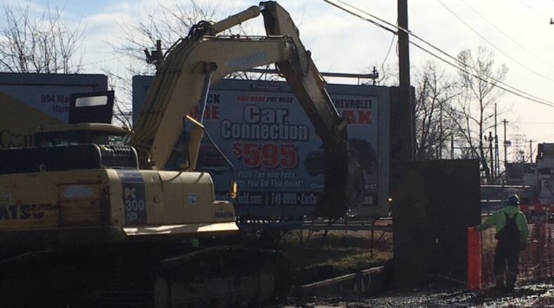 Crews are working on Wednesday, Feb. 13, to repair a large water main break on North Third Street in Hamilton, across from the city’s power plant and the Rumpke trash transfer station, according to Public Works Director Jim Williams.