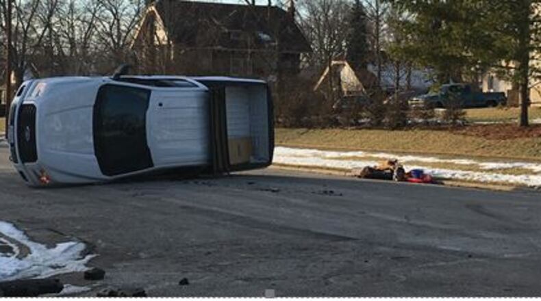 Middletown emergency crews responded to The Alameda and Superior Avenue Friday afternoon after a pick-up truck rolled over. RICK McCRABB / STAFF