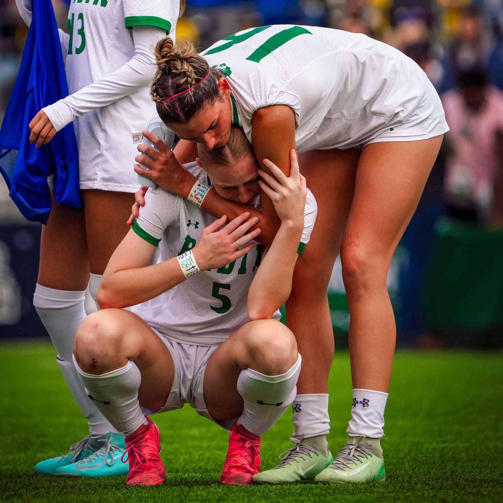 Badin High School senior Braelyn Even (right) consoles senior Addi Marshall after they fell to Bay High School 1-0 in the Division III state championship game on Saturday afternoon at Historic Crew Stadium. MATT GRIMES / CONTRIBUTED PHOTO