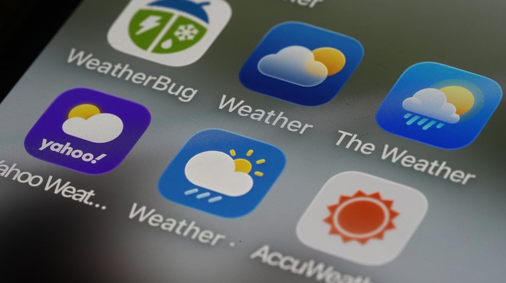 This photo shows various weather apps arranged on a smartphone in Glenside, Pa., Thursday, Jan. 22, 2026. (AP Photo/Matt Rourke)