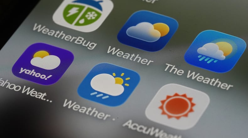 This photo shows various weather apps arranged on a smartphone in Glenside, Pa., Thursday, Jan. 22, 2026. (AP Photo/Matt Rourke)