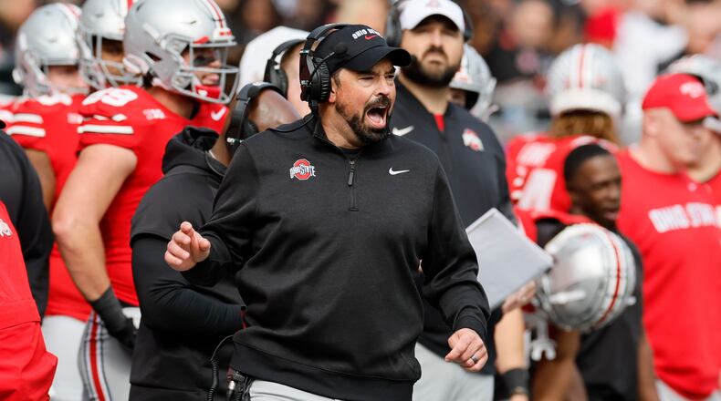 Ohio State head coach Ryan Day shouts to his team during the first half of an NCAA college football game against Penn State, Saturday, Nov. 1, 2025, in Columbus, Ohio. (AP Photo/Jay LaPrete)