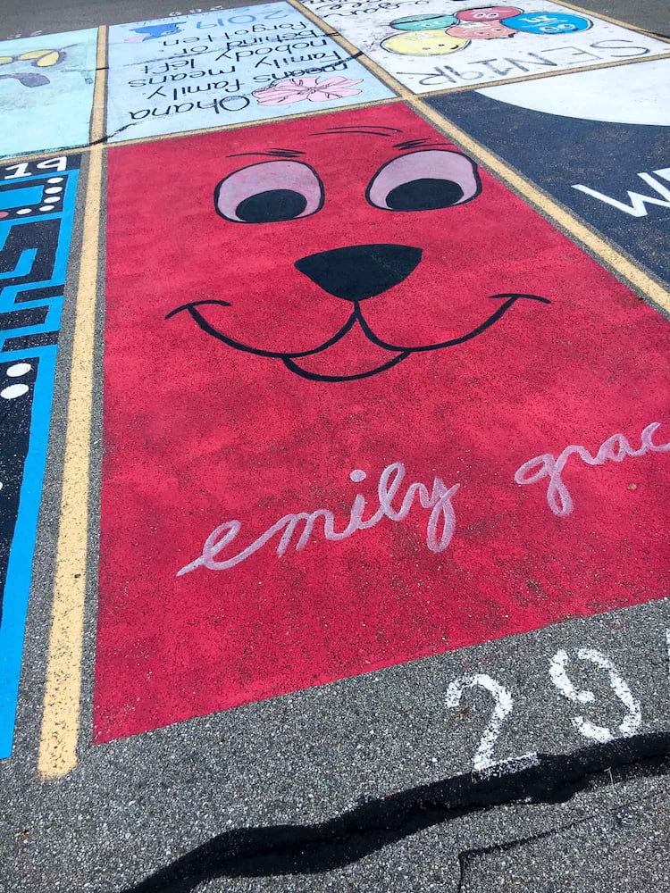 PHOTOS Lakota East seniors paint parking spots