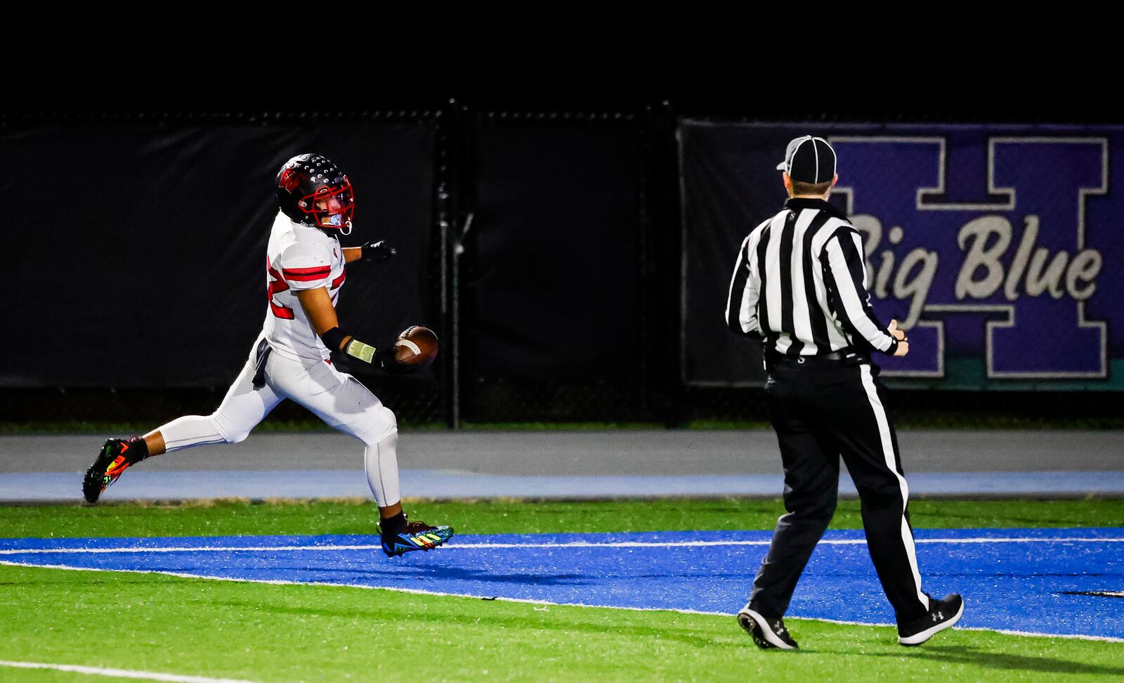 Lakota West's Braydon Johnson carries the ball for a touchdown during their football game against Hamilton Friday, Oct. 20, 2023 at Virgil M. Schwarm Stadium in Hamilton. Lakota West won 42-14. NICK GRAHAM/STAFF