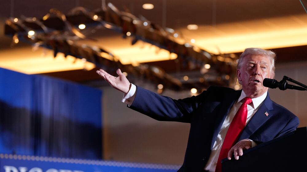 FILE - President Donald Trump gestures to a chart as he speaks at Mount Airy Casino Resort, Dec. 9, 2025, in Mount Pocono, Pa. (AP Photo/Alex Brandon, File)