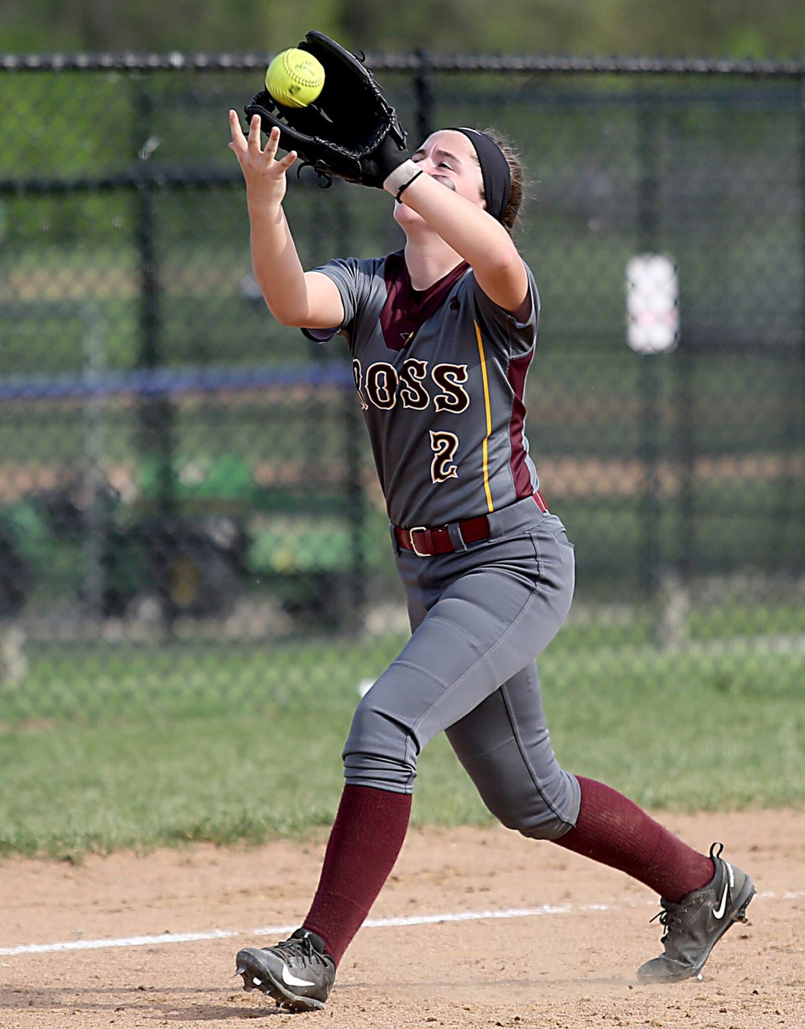 Ross third baseman Emily Poling secures an Edgewood popup during Friday’s game in Trenton. CONTRIBUTED PHOTO BY E.L. HUBBARD